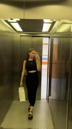Everyday moments captured in Klin: elevator selfie, park fountain