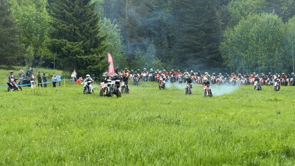 Motocross racers start engines at dawn event in Russia