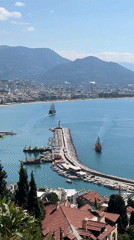 Morning views document Alanya's bustling Mediterranean harbor and coastline