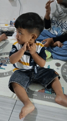 Relaxed home gathering in Pragu centered around a baby