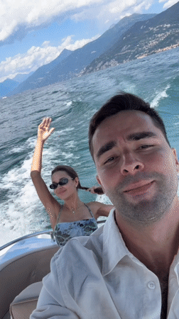Boat ride on Lake Como with mountain views