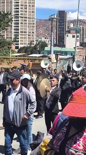 Marching band performs for crowds on La Paz street