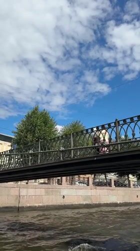 Cruising Saint Petersburg's canals past bridges and historic embankments