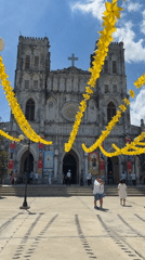 Inside and outside a decorated Catholic cathedral in Hội Tín
