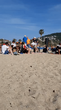 Beach band entertains relaxing crowds in Alanya, Turkey