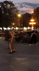 Evening street festival with band, motorcycles draws crowds in Moscow