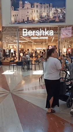Inside Molfetta's Mongolfiera mall on a Sunday morning