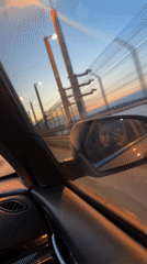 Woman documents car journey through Chaikovsky Russia during twilight