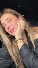 Woman takes selfies in Ukrainian village Saturday morning