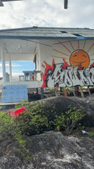 Graffitied abandoned buildings documented along Thailand coastal village
