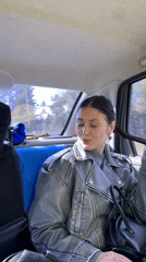 Young woman documented during casual car journey in Russia