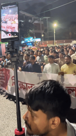 Nighttime procession with Bengali banners fills Dhaka streets
