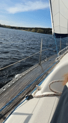 Sailboat navigates choppy lake waters in Tolyatti, Russia