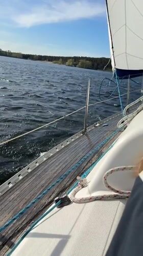 Sailboat navigates choppy lake waters in Tolyatti, Russia