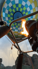 Tourist documents early morning visit to Bulgarian fortress, balloon flight