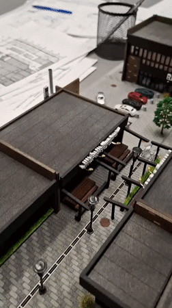 Architectural models and billiard table observed in Irkutsk offices