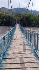 Naryn River running high and turbulent through Naryn City