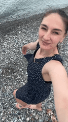 Mother and baby enjoy beach picnic in Sochi