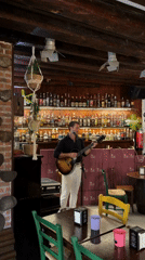 A Venice evening: live music, street market, and old clocktower