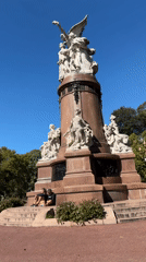 Afternoon street life documented around Buenos Aires monument