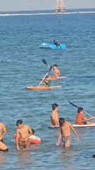Sanur Beach buzzing with activity on a clear Bali morning