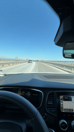 Driver records highway journey with mountain views near Skutare