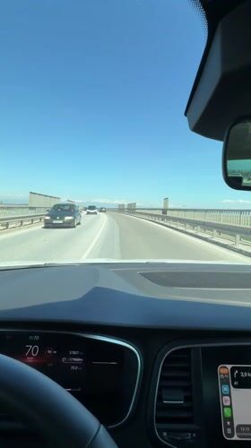Driver records highway journey with mountain views near Skutare