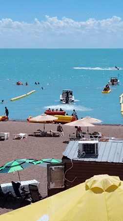 Summer beach day at a Kazakh lakeside resort