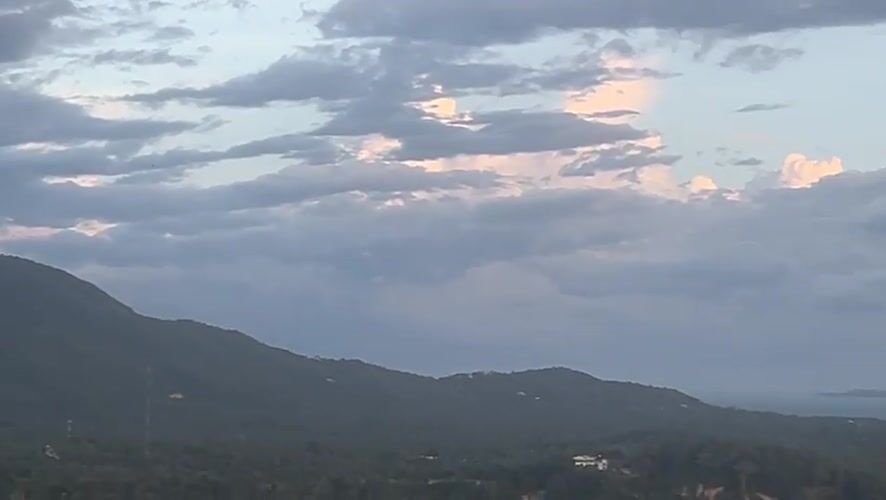 Scenic mountain-to-ocean landscape captured near Baan Hin Kong, Thailand