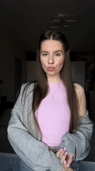 Woman poses for indoor photo session in Klin, Russia
