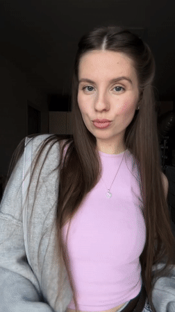 Woman poses for indoor photo session in Klin, Russia