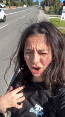 Woman filmed walking, speaking to camera on Bicton sidewalk
