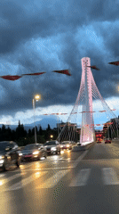Rainy evening drive past Millennium Bridge in Podgorica captured