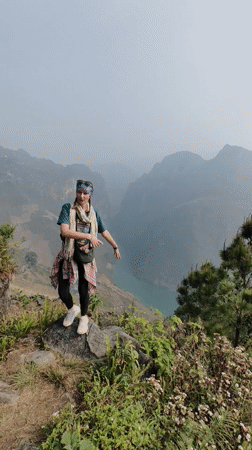 Tourists pose for photos at scenic Meo Vac viewpoints