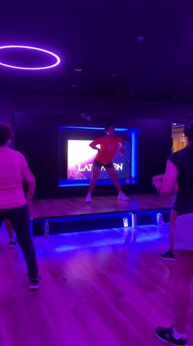 Early morning fitness dance class held in San Isidro studio