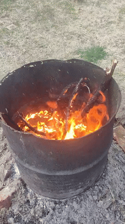 Controlled burn documented in metal barrel in Kratovo, Russia