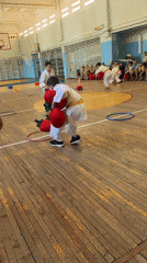 Children compete in karate uniform relay games at Izhevsk gymnasium