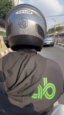 Gojek rider moves through busy Kebayoran Baru streets