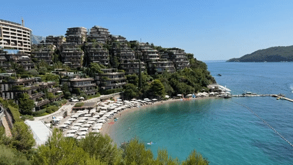 Budva's Adriatic coastline on a busy summer afternoon