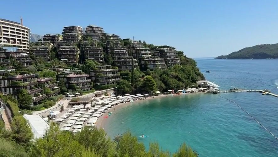 Budva's Adriatic coastline on a busy summer afternoon