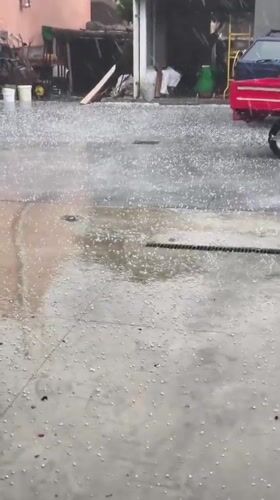 Rainstorm rolls through a quiet Italian hill town