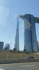 Morning skyline view of Dubai captured from moving vehicle