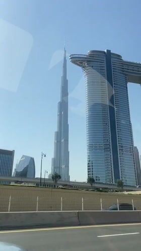 Morning skyline view of Dubai captured from moving vehicle
