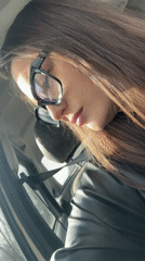 Woman singing in car captured in Foki, Russia