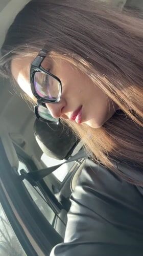 Woman singing in car captured in Foki, Russia