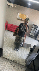 Person takes mirror selfie in Kuta, Indonesia