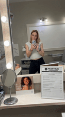 Woman takes selfie at makeup mirror in Vsevolozhsk