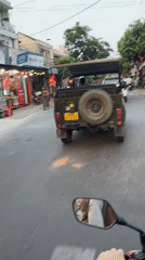 Green military vehicle spotted in Hội An traffic