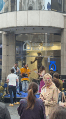 Street band performs outside Evropska Kuca in Belgrade