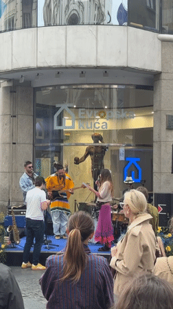 Street band performs outside Evropska Kuca in Belgrade